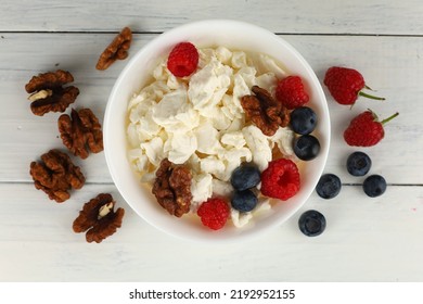 Homemade Cheese With Berries And Nuts. Breakfast Food With Quark