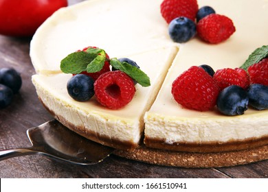 Homemade Cheesecake With Fresh Raspberries And Mint For Valentines Day - Healthy Organic Summer Dessert Pie Cheesecake. Vanilla Cheese Cake With Cheese