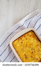 Homemade Cheesy Amish Breakfast Casserole On A White Wooden Background, Top View. Flat Lay, Overhead, Top View. Copy Space.