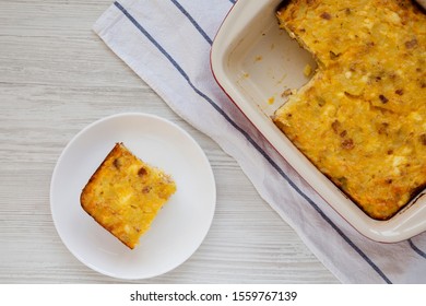 Homemade Cheesy Amish Breakfast Casserole On A White Wooden Background, Top View. Flat Lay, Overhead, From Above. 