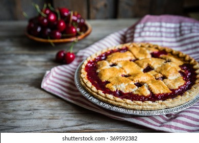 Homemade Cherry Pie On Rustic Background