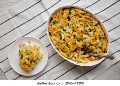 Homemade Chicken Alfredo Pasta Bake With Parsley, Overhead View. Flat Lay, Top View, From Above. 