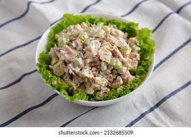 Homemade Chicken Salad With Lettuce In A White Bowl, Side View.