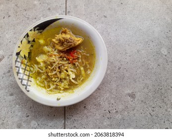 Homemade Chicken Soup ( Soto Ayam In Indonesian ) In A Bowl.  Healthy Food Concept, Food Recipe, Low Cholesterol, Blank Space, Copy Space, Copy Text