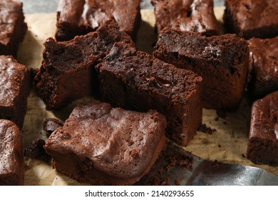Homemade Chocolate Brownies made from chocolate 80 percentages with chocolate chip 98 percentage inside on dark tone. Use monk fruit sweeteners. Low Carb Diet Foods. Ketogenic Diet.