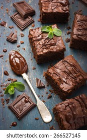 Homemade Chocolate Brownies On Dark Background, Top View