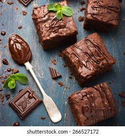 Homemade Chocolate Brownies On Dark Background, Top View