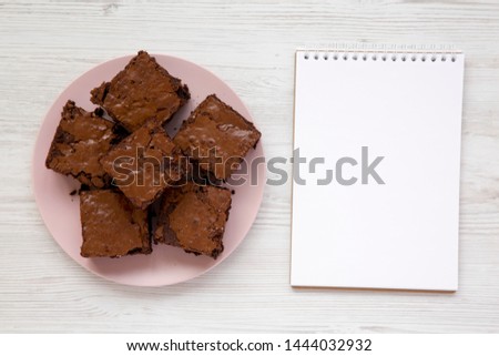 Similar – Image, Stock Photo Pink chocolate brownie in a tray on white table