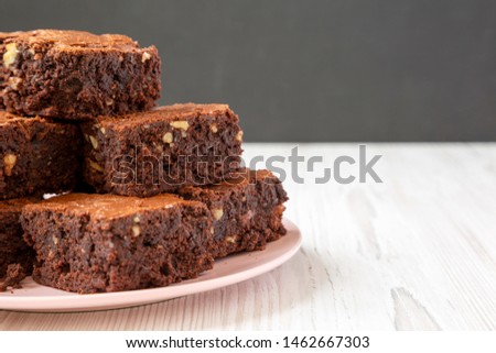 Image, Stock Photo Pink chocolate brownie in a tray on white table