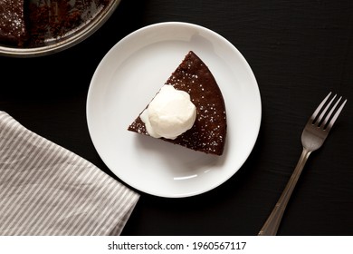 Homemade Chocolate Cake With Ice Cream On A Black Background, Top View. Flat Lay, Overhead, From Above.