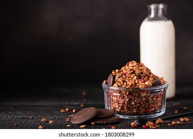 Homemade Chocolate Granola With Milk On A Dark Background