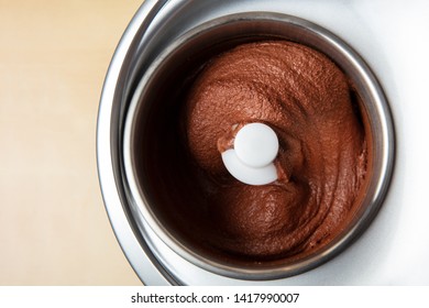 Homemade Chocolate Ice Cream Is Prepared In An Ice Cream Maker