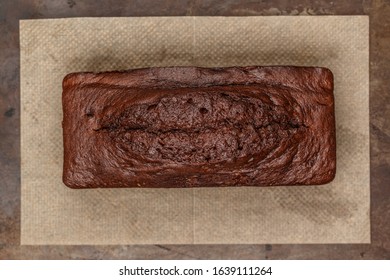 Homemade Chocolate Pound Cake Loaf On The Baking Sheet.  Delicious Dessert.  Selective Focus, Top View