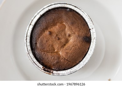 Homemade Chocolate Souffle In A Bowl On A White Plate. Close Up.