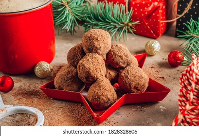 Homemade chocolate truffles candy ball on a christmas background. Selective focus - Powered by Shutterstock