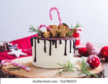 Homemade Christmas Cake On A Rustic Wood Stand And Festive Decoration