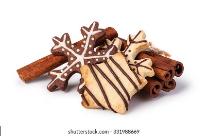Homemade christmas cookies on wooden table, isolated on white background