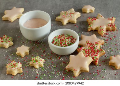 Homemade Christmas Cookies With Royal Icing And Green, Red Candy Sprinkles