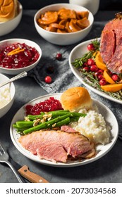 Homemade Christmas Ham Dinner With Potatoes Cranberry And Pecan Pie