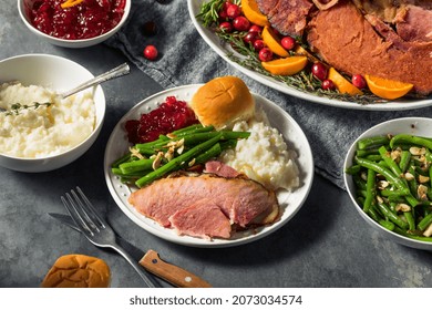 Homemade Christmas Ham Dinner With Potatoes Cranberry And Pecan Pie