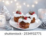 Homemade Christmas mini fruit cakes cupcakes with sugar icing frosting, traditional Christmas dessert