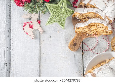 Homemade Christmas Stollen Cake with Icing Sugar, Marzipan and Raisins. Traditional Dresdner christ baked pastry for Christmas dinner - Powered by Shutterstock