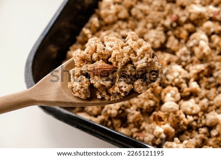 Homemade Chunky Granola In A
Wooden Spoon