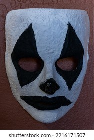 Homemade Clown Or Mime Mask On Wall