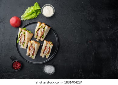 Homemade Club Sandwich Made With Turkey, Bacon, Ham, Tomato, On Black Background, Top View With Copy Space For Text