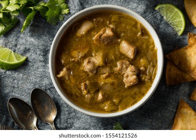 Homemade Colorado Pork Green Chili Soup With Chips And Lime