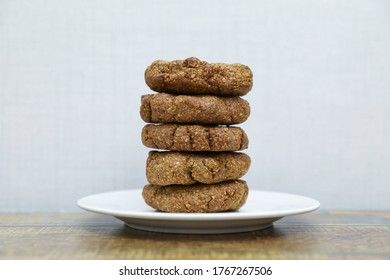 Homemade Cookies With Flaxseed, Oatmeal, Coconut And Nuts On A Wooden Table, Healthy Vegetarian