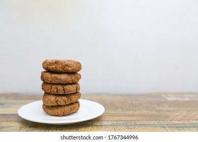 Homemade Cookies With Flaxseed, Oatmeal, Coconut And Nuts On A Wooden Table, Healthy Vegetarian