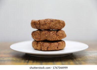 Homemade Cookies With Flaxseed, Oatmeal, Coconut And Nuts On A Wooden Table, Healthy Vegetarian