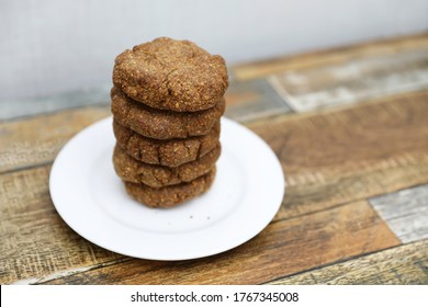 Homemade Cookies With Flaxseed, Oatmeal, Coconut And Nuts On A Wooden Table, Healthy Vegetarian