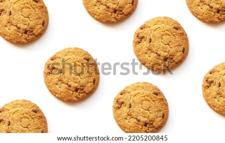 Homemade cookies with nuts and candied fruits on a white background. Pattern food sweets cookies.