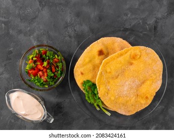 Homemade Corn Flatbread Cilantro Greens Tomato Salsa. Handmade Mexican Tortilla Taco Quesadilla Vegetable. Traditional Indian Makki Ki Roti Bread Top View. Gluten Free Flour Dough Authentic Cuisine.