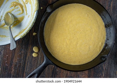 Homemade Cornbread Batter In Cast Iron Pan Flat Lay