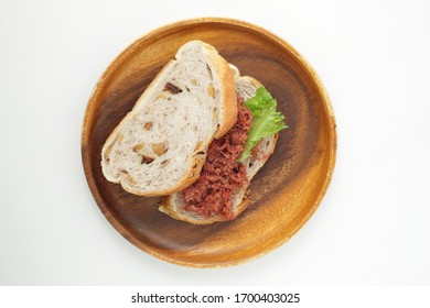Homemade corned beef and lettuce French bread sandwich