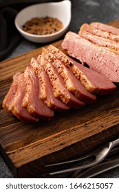 Homemade Corned Beef Sliced On A Cutting Board