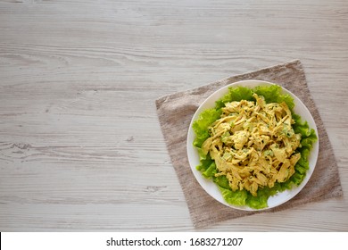 Homemade Coronation Chicken Salad On A White Plate, Overhead View. Flat Lay, From Above, Top View. Copy Space.