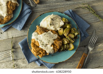 Homemade Country Fried Steak With Gravy And Potatoes