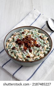 Homemade Creamy Bacon Pea Salad In A Bowl, Side View. 