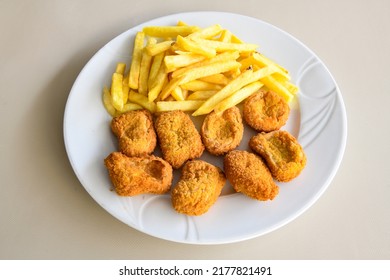 Homemade Crispy Chicken Tenders And French Fries , Top View. Flat Lay, Overhead, From Above.