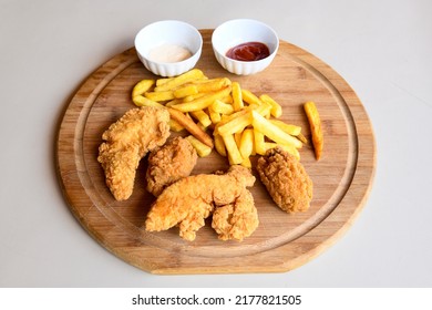 Homemade Crispy Chicken Tenders And French Fries , Top View. Flat Lay, Overhead, From Above.