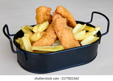 Homemade Crispy Chicken Tenders And French Fries , Top View. Flat Lay, Overhead, From Above.