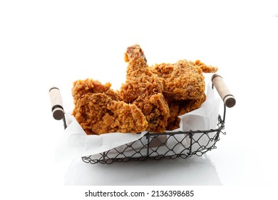 Homemade Crispy Fried Chicken On Wire Basket, Isolated On White