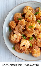 Homemade Crispy Salt And Pepper Shrimp With Scallions On A Plate, Top View. Flat Lay, Overhead, From Above. Close-up.