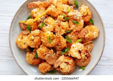 Homemade Crispy Salt And Pepper Shrimp With Scallions On A Plate, Top View. Flat Lay, Overhead, From Above. 