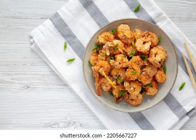 Homemade Crispy Salt And Pepper Shrimp With Scallions On A Plate, Top View. Flat Lay, Overhead, From Above. Copy Space.