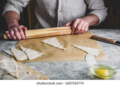 Homemade Croissant Preparing. Baker Rolls The Puff Pastry